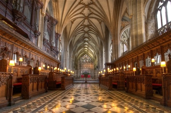 An internal view of Bristol Cathedral looking from the choir stalls down towards the knave.